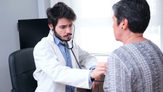 Young,Doctor,Health,Care,Provider,Performing,A,Physical,Exam,And