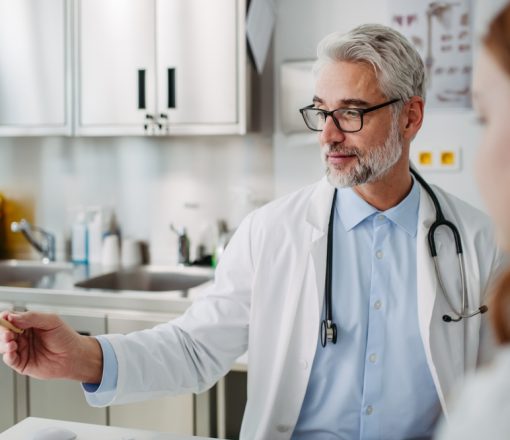 Doctor,And,Tennage,Girl,Patient,,During,Visit.,Concept,Of,Preventive
